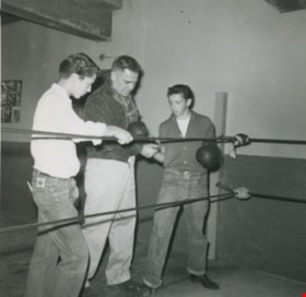 Harry Twist and young boxers at ringside, 1958 thumbnail