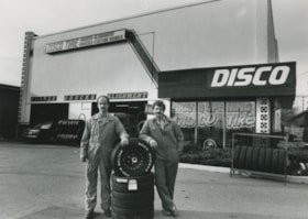 Two men outside a Disco Tire store, ca.1983 thumbnail