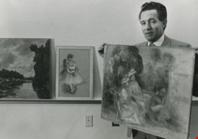 Man showing off art work, ca.1983 thumbnail