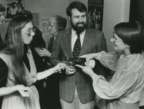 Unidentified people enjoying wine, ca.1983 thumbnail