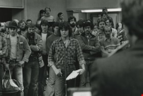 Carl Svanholm (at mic) and angry PVI students confront Lloyd Axworthy, ca.1983 thumbnail