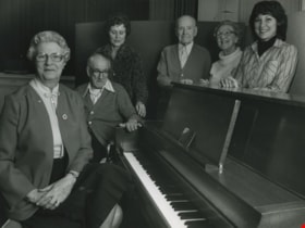 Six people around a piano, ca.1983 thumbnail