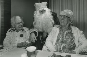 Myrtle Dickey; Tom Slack (Santa); Tinie Busse at Deer Lake Hospital, ca.1982 thumbnail