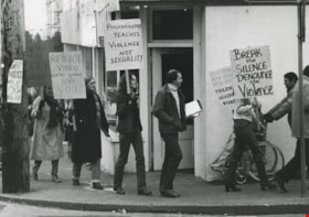 People protesting in front of the Black Cat Video Store, ca.1982 thumbnail