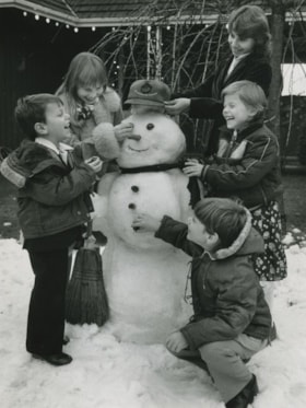 Children dressing up a Snowman, [1982] thumbnail