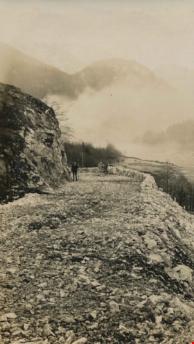 Rock bluff over complete roadway, 1926 thumbnail