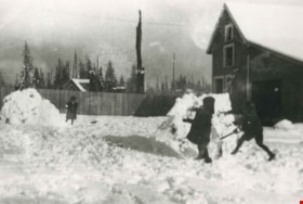 Playing in the snow, 1910 (date of original), copied 1986 thumbnail