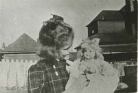 Florence Hart and her doll, 1907 (date of original), copied 1986 thumbnail