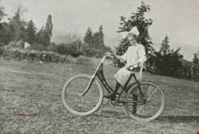 Florence Hart and Bicycle, 1911 (date of original), copied 1986 thumbnail