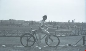 Ruby Johnson on her bicycle, 1939 thumbnail