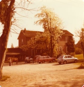 Lubbock's farm house and parking lot, 1977 thumbnail