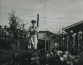 Betty Stevenson in the Stevenson family garden, [195-] (date of original), copied 1992 thumbnail