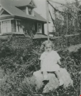 Young girl in a garden, 1929 (date of original), copied 1992 thumbnail