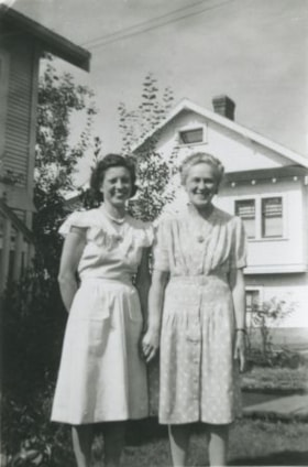 Two women standing in a garden, [194-?] (date of original), copied 1992 thumbnail