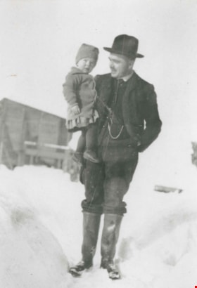 Man and child in the snow, [191-?] (date of original), copied 1992 thumbnail