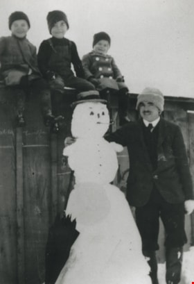 Grant family and snowman, 1920 (date of original), copied 1992 thumbnail
