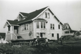 Reliable House Movers raising a house, [192-?] (date of original), copied 1992 thumbnail