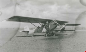 Bert Price beside home-built airplane, 1931 (date of original), copied 1992 thumbnail