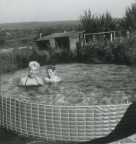 Madelaine and Janet Anderson in their pool, 1961 (date of original), copied 1991 thumbnail