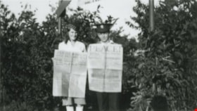 Jean and Ian Macdonald with newspapers, [1932] (date of original), copied 1991 thumbnail
