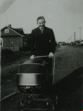 Lyle Le Grove with a baby carriage, [1943] (date of original), copied 1991 thumbnail