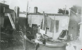 Jack Nichols in a baby carriage, 1936 (date of original), copied 1991 thumbnail
