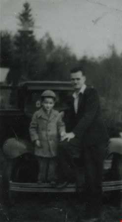 Man and Boy on Car Bumper, [between 1940 and 1944] (date of original), copied 1991 thumbnail