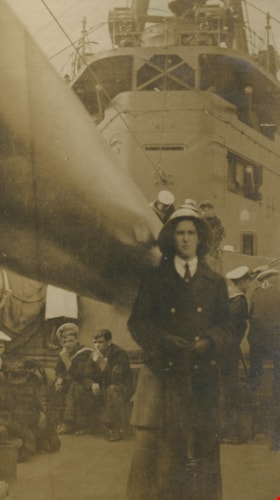Woman standing on the HMS Hood, 1921 thumbnail