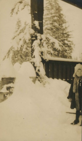 Child playing in the snow, [1915] thumbnail