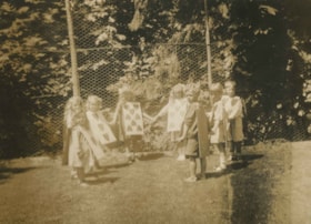 Children in costume for Alice in Wonderland party, 1912 thumbnail