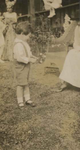 Young boy at Alice in Wonderland party, 1912 thumbnail