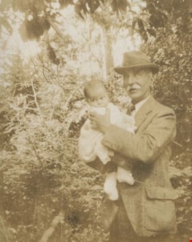 Claude holding Robert, 1927 thumbnail