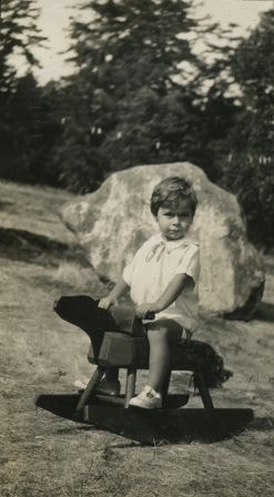 Robert sitting on a rocking horse, [1930] thumbnail