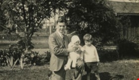 Bob Peers and his children in the garden, [1930] thumbnail