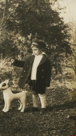 Robert playing with a toy dog, [1930] thumbnail