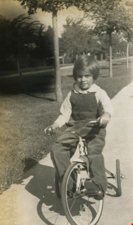 Babs riding on a tricycle, [1942] thumbnail