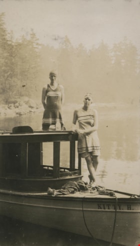 Swimmers standing in a boat, 1921 thumbnail