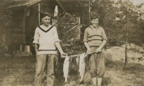 Boys with fish, 1921 thumbnail