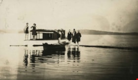 Swimmers standing in a boat, 1923 thumbnail