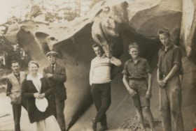 Standing under a rock formation, [1922] thumbnail