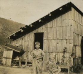 Two boys standing outside, 1922 thumbnail