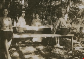 Group at a picnic table, 1921 thumbnail