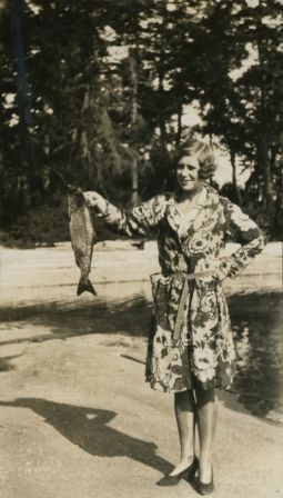 Woman holding a fish, [1923] thumbnail