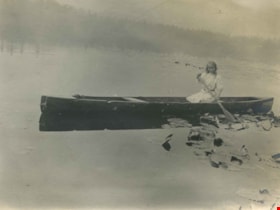 Kitty Hill canoeing on Deer Lake, 1910 thumbnail