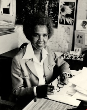 Rosemary Brown at her desk, [between 1976 and 1979] thumbnail