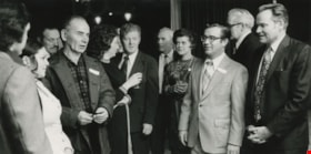 Burnaby Alderman Merrill Gordon (second from right) following a candidates' meeting, 1973. Item no. 480-263 thumbnail