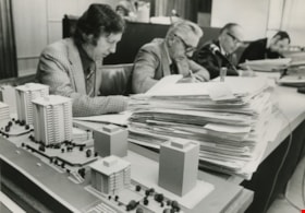 Anthony Parr works beside an architectural model, May 1974 thumbnail