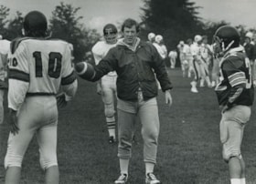 Ron Woodward hands the ball over, [1979] thumbnail