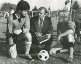 Coach Popowich talking to his players, October 1979 thumbnail