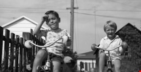 Boys on tricycles, 1962 thumbnail